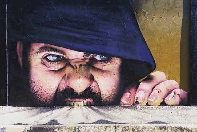 На эти граффити в Милане стоит смотреть внимательнее (10 фото)